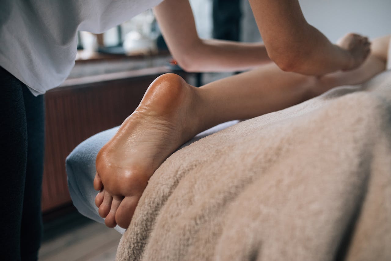 Mastering the First Impression: Your intriguing post title goes here A soothing foot massage in a calming indoor setting, promoting relaxation and self-care.